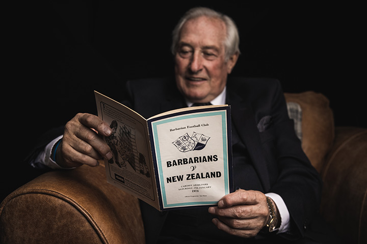 Gareth Edwards reading Barbarians vs New Zealand 1973 programme